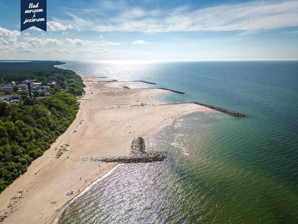 Caloroczne Domki Nad Morzem I Jeziorem Jeezierzany Exterior foto